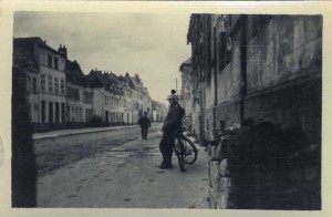 Man leaning on bike